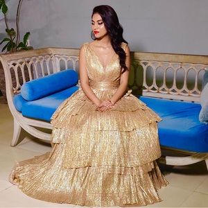 Gorgeous gold gown by Tarik Ediz